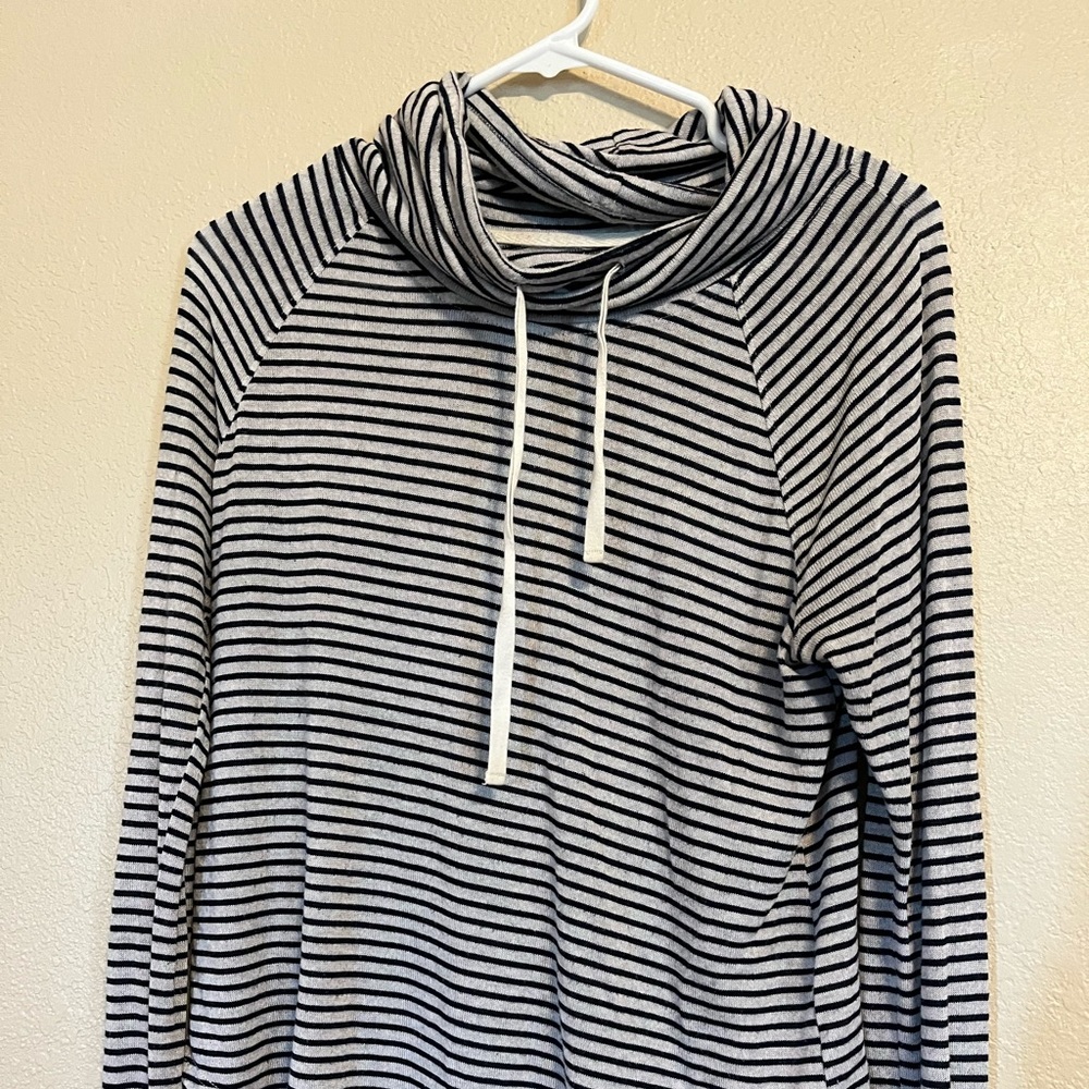 Small Long Sleeved shirt from Hollister.